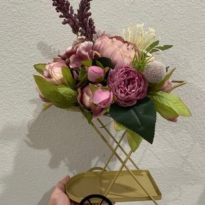 Rolling cart vintage decorate with silky flowers